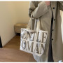 Sac à Bandoulière en Toile Kaki 33x44x13cm - Élégance et Fonctionnalité