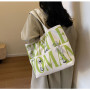 Sac à bandoulière en toile vert clair 33x44x13 cm - Style et praticité pour votre quotidien