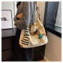 Sac à bandoulière en toile 41x34x11cm Kaki - Élégance et Praticité pour un Look Décontracté