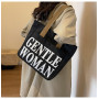 Sac à bandoulière en toile noir et blanc 33x41x12 cm - Élégance pratique pour vos déplacements